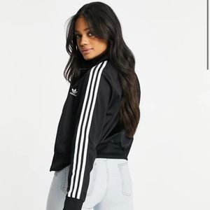 Black Adidas jacket with white stripes
